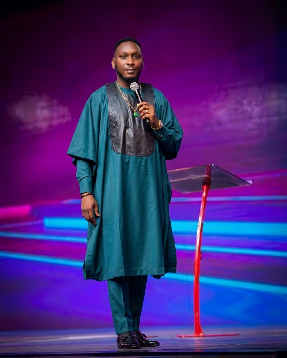 Prophet Moses Ugheighele ministering on stage.